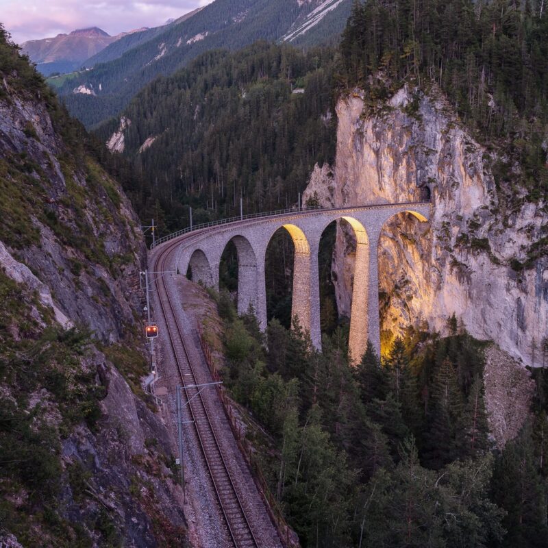 The Landwasser Viaduct is a single-track six-arched curved limestone railway viaduct. A signature structure of the World Heritage-listed Albula Railway.